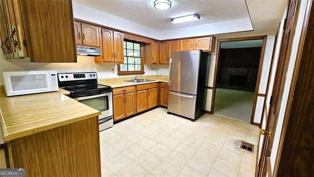 1056 Spring Mill Drive SW, Lilburn, GA 30047