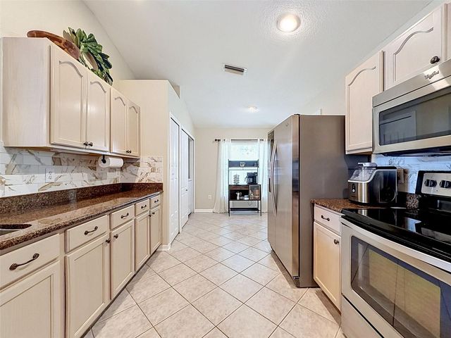 26714 MIDDLEGROUND LOOP, Wesley Chapel, FL 33544