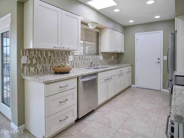 11025 N MADISON Drive, Sun City, AZ 85351
