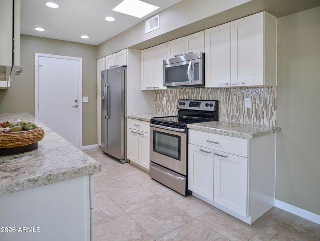 11025 N MADISON Drive, Sun City, AZ 85351