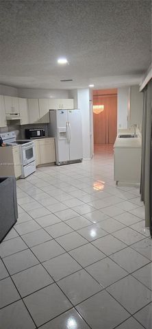 6470 NW 77th Pl, Parkland, FL 33067