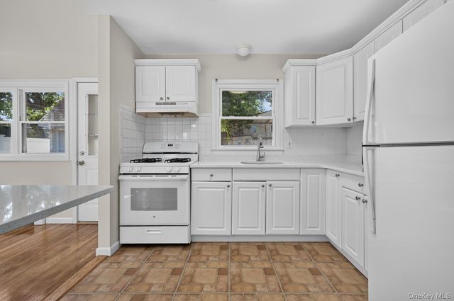 48 Locust Street, Westbury, NY 11590
