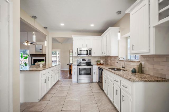 9807 Churchill Way Drive, Houston, TX 77065