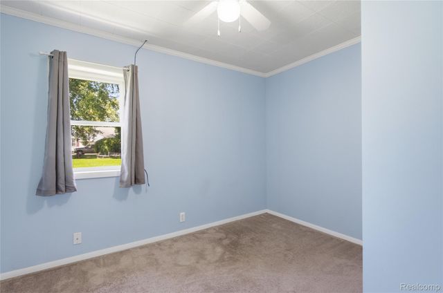 5153 Raymond Avenue, Burton, MI 48509