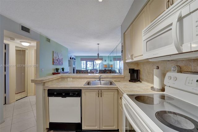 2228 N Cypress Bend Drive 103, Pompano Beach, FL 33069
