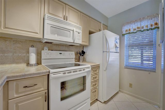 2228 N Cypress Bend Drive 103, Pompano Beach, FL 33069