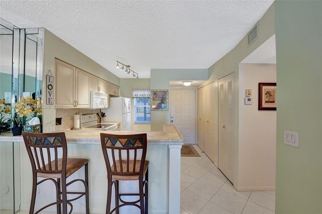 2228 N Cypress Bend Drive 103, Pompano Beach, FL 33069