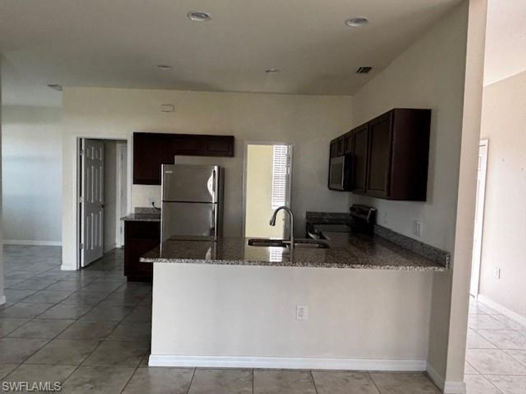 211 NW 28th ST, CAPE CORAL, FL 33993 — photo 3