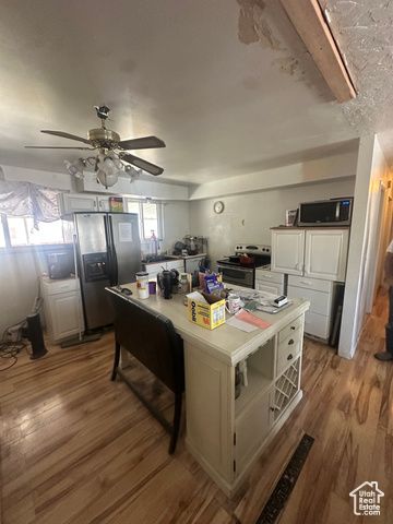 5552 S SOUTH HEW WOOD DR, Taylorsville, UT 84129