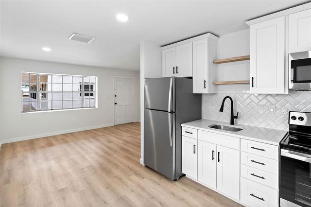 1028 BASS BOULEVARD, Dunedin, FL 34698