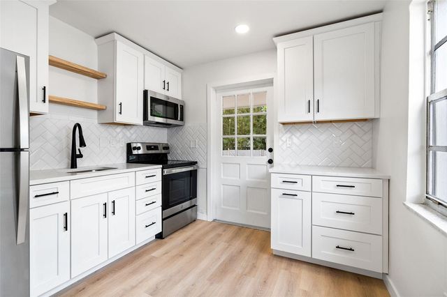 1028 BASS BOULEVARD, Dunedin, FL 34698