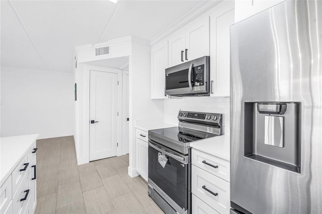 10375 PARADISE BOULEVARD 51, Treasure Island, FL 33706