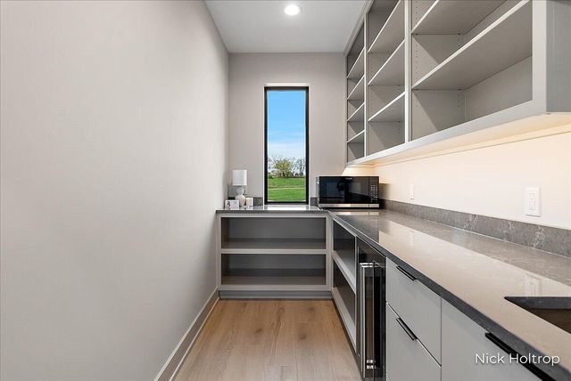 312 Ottogan Hills Court, Dorr, MI 49323