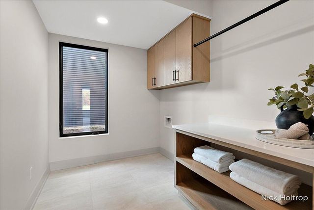 312 Ottogan Hills Court, Dorr, MI 49323