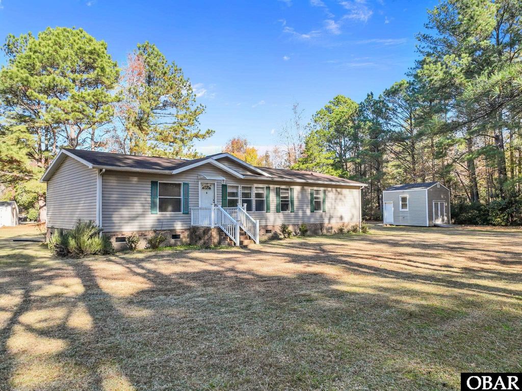 Image 1 of property listing at 105 Forest Glen Road, Poplar Branch, NC 27965