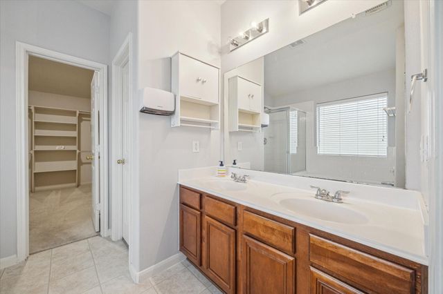 9842 Lynette Falls Drive, Houston, TX 77095