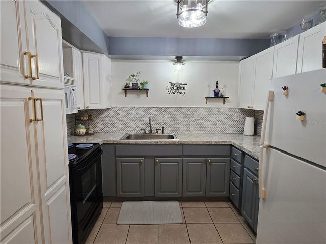 1902 HONOUR ROAD 8, Orlando, FL 32839