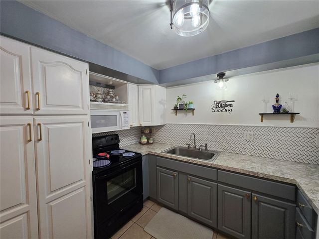 1902 HONOUR ROAD 8, Orlando, FL 32839