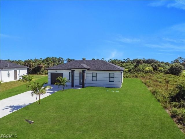 713 Roma AVE S, Lehigh Acres, FL 33974