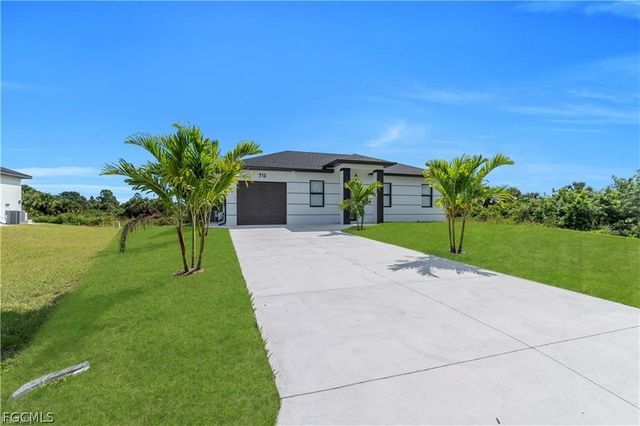 713 Roma AVE S, Lehigh Acres, FL 33974