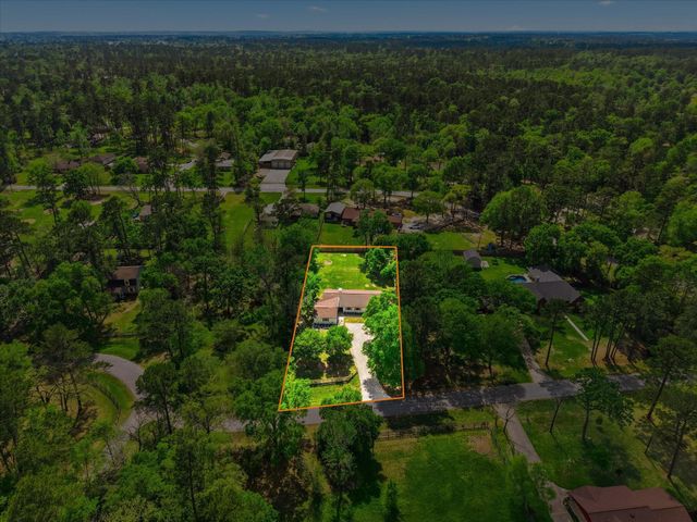 26527 Bayou Tesch Drive, Magnolia, TX 77354