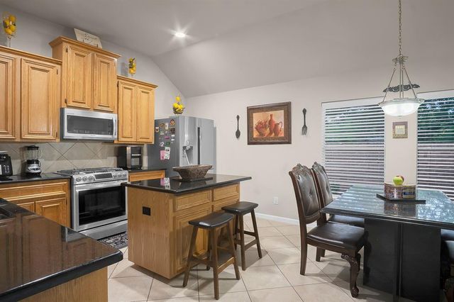 9827 Kimberly Loch Lane, Houston, TX 77089