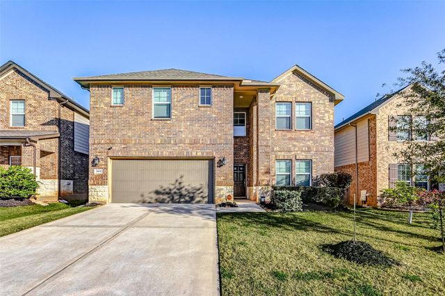 2165 Woodland Pine Drive, Conroe, TX 77384