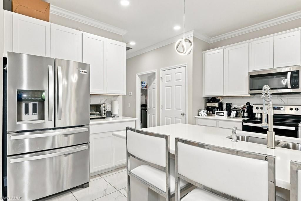 Image 22 of property listing at 1029 NW 34th AVE, Cape Coral, FL 33993