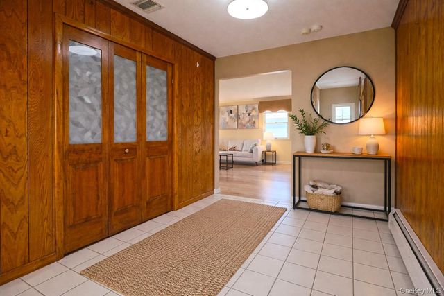 18 Strathmore Village Drive, South Setauket, NY 11720