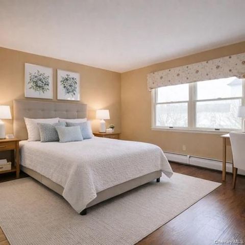 18 Strathmore Village Drive, South Setauket, NY 11720