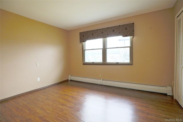 18 Strathmore Village Drive, South Setauket, NY 11720