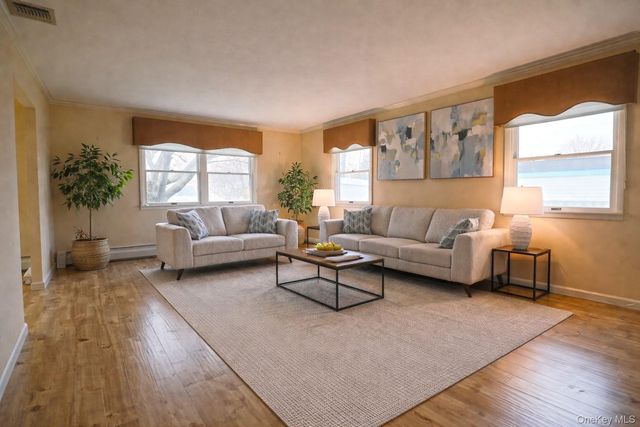 18 Strathmore Village Drive, South Setauket, NY 11720