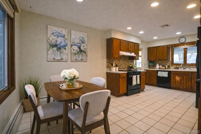 18 Strathmore Village Drive, South Setauket, NY 11720