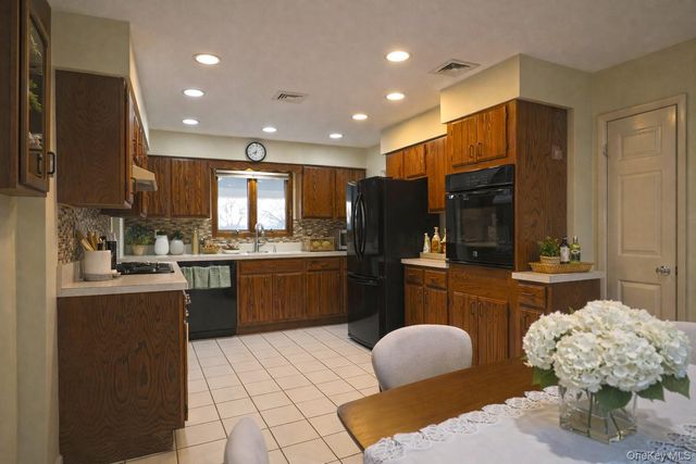 18 Strathmore Village Drive, South Setauket, NY 11720