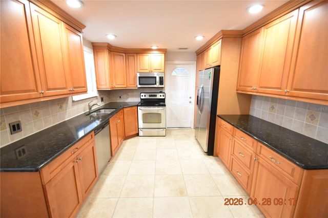 3223 W WYOMING AVENUE, Tampa, FL 33611