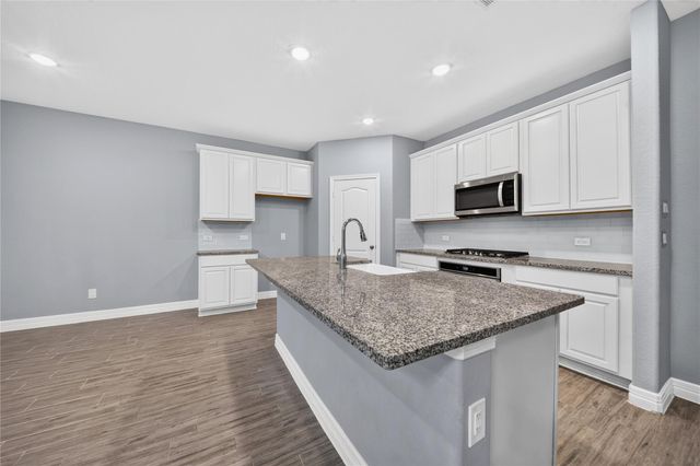 607 Spotted Sunfish Drive, Willis, TX 77318