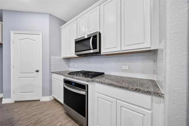607 Spotted Sunfish Drive, Willis, TX 77318