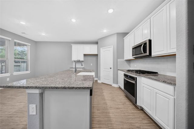 607 Spotted Sunfish Drive, Willis, TX 77318