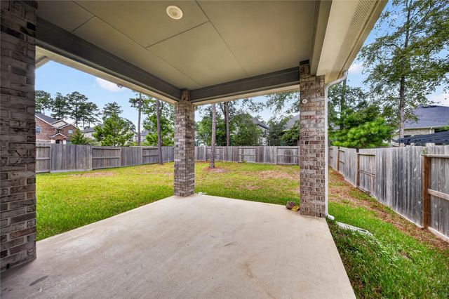 607 Spotted Sunfish Drive, Willis, TX 77318