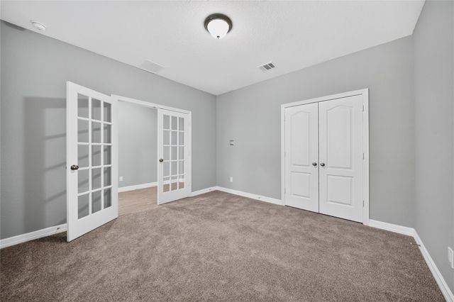 607 Spotted Sunfish Drive, Willis, TX 77318
