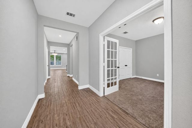 607 Spotted Sunfish Drive, Willis, TX 77318