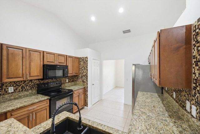1218 SW Melrose Avenue, Port St. Lucie, FL 34953