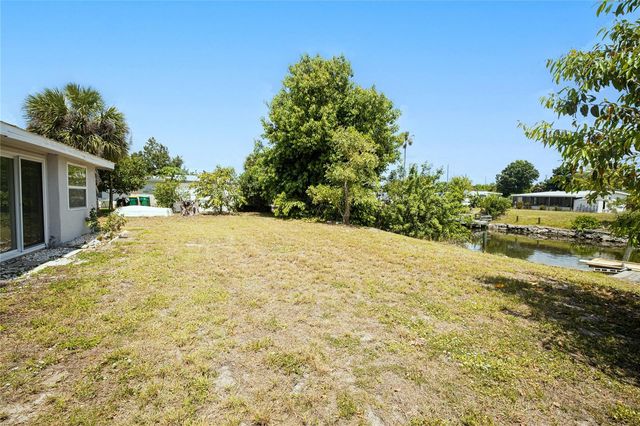 203 WATERWAY CIRCLE NE, Port Charlotte, FL 33952