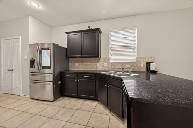 9115 Eldorado Glen Drive, Humble, TX 77338