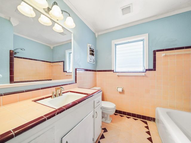 9015 Bintliff Drive, Houston, TX 77074
