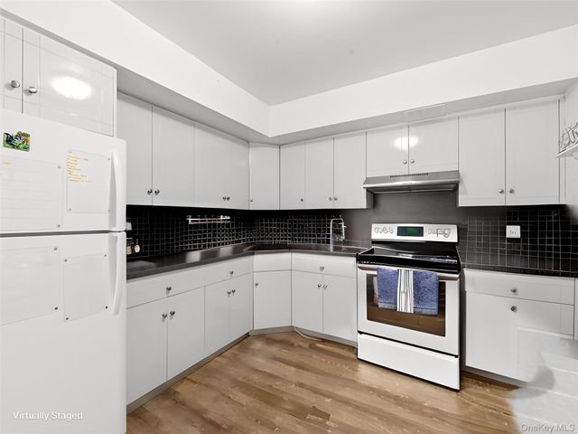 61-26 164 Street, Fresh Meadows, NY 11365