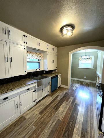 1213 SW Plass AVE, Topeka, KS 66604