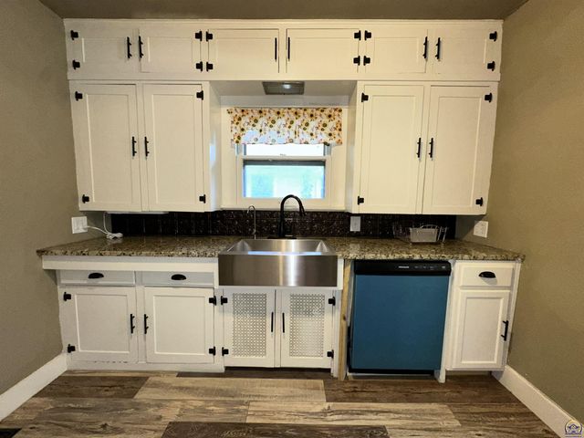 1213 SW Plass AVE, Topeka, KS 66604