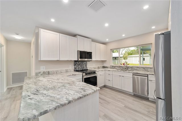 34 Garden Mall Court, Inglis, FL 34449