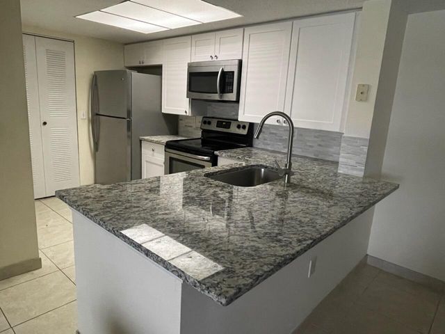 5045 Wiles Road 308, Coconut Creek, FL 33073